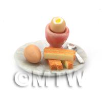 Dolls House Miniature Boiled Egg with the Top off in a Pink Egg Cup