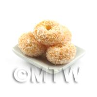 Miniature Sugared Ring Donuts On A Square Plate