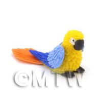 Yellow Dolls House Miniature Baby Parrot With Blue Wings and Orange Tail