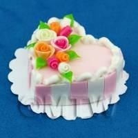 Miniature Pink Cake With Rose Arrangement 