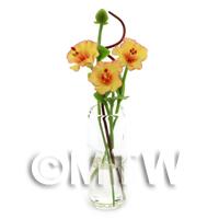 4 Miniature Yellow Cut Flowers in a Glass Vase 