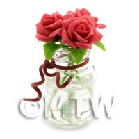 3 Miniature Dark Red Roses in a Short Glass Vase 