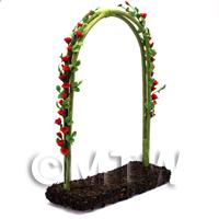 Red English Climbing Roses On A Miniature Wire Arch 
