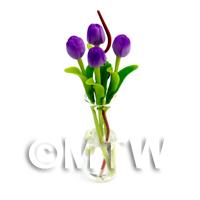 4 Miniature Long Stemmed Purple Tulips in a Glass Vase