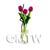 3 Miniature Long Stemmed Dark Pink Tulips in a Glass Vase