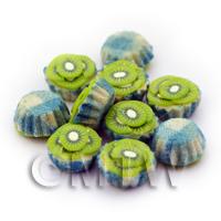 Miniature Kiwi And Cream Cupcake With A Blue Paper Cup