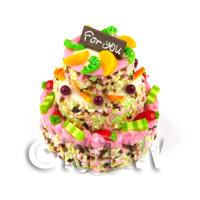 Miniature 3 Tier Celebration Cake topped with Candied Fruit and Sprinkles