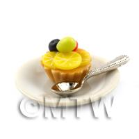 Dolls House Cherry and Lemon Suprise Tart on a Plate With a Spoon