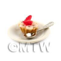 Dolls House Banana and Strawberry Tart on a Plate With a Spoon