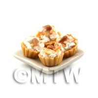 4 Dolls House Chopped Almond Tarts on a 19mm Square Plate